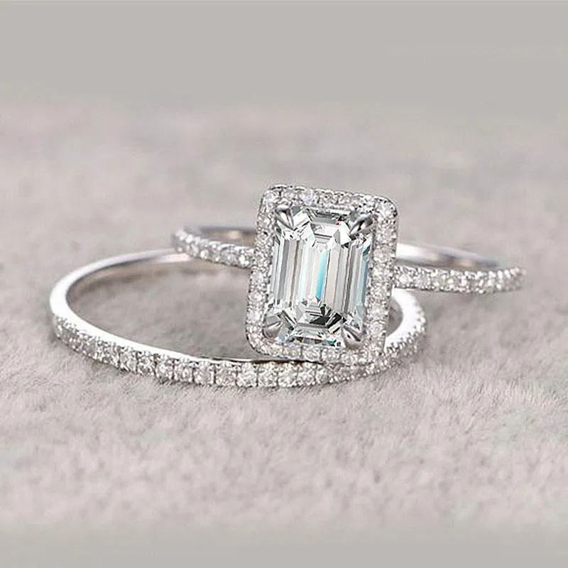 Halo Emerald Cut Sterling Silver Bridal Set with Side Stone Band