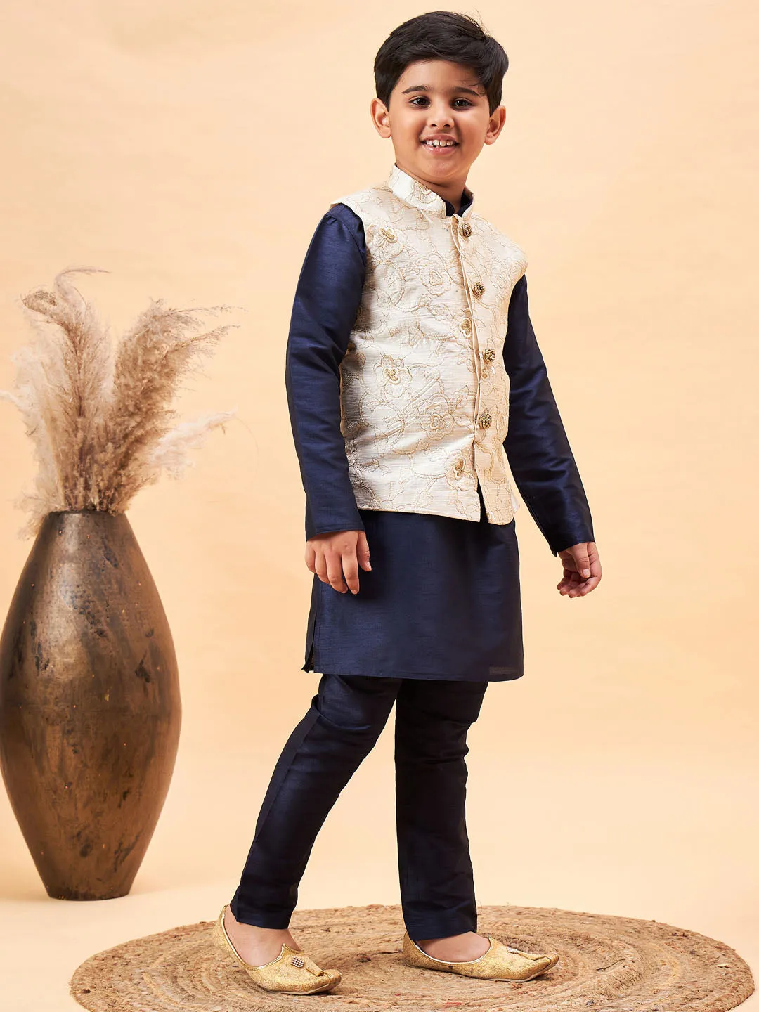 VASTRAMAY Boy's Beige Woven Nehru Jacket With Navy Blue Kurta Pyjama Set